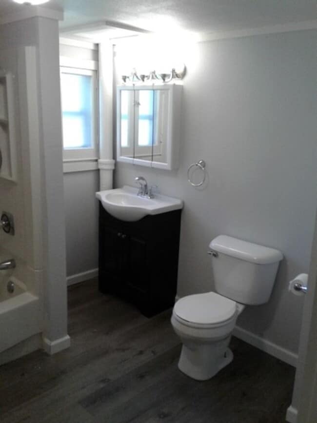 Building Photo - Beautiful 3 bed / 1 bath home on corner lot with attached garage in quiet Sparta neighborhood!