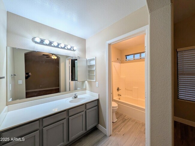 Building Photo - 7059 W Gardenia Ave