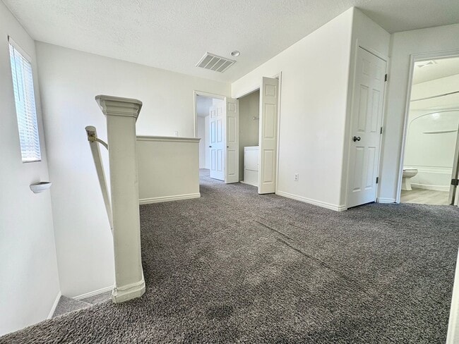 Building Photo - Spacious 3 Bed Townhome in West Valley City with Gated Yard, Garage & Pool