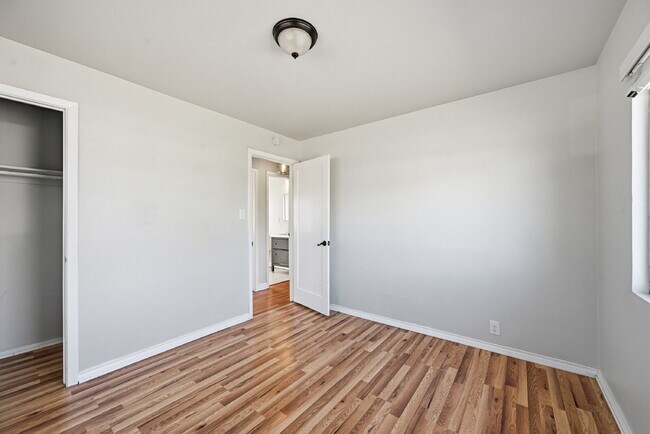 Building Photo - $2,140.95 -  2 bed, 1 bath located in Denver with a big backyard and In Unit Laundry!