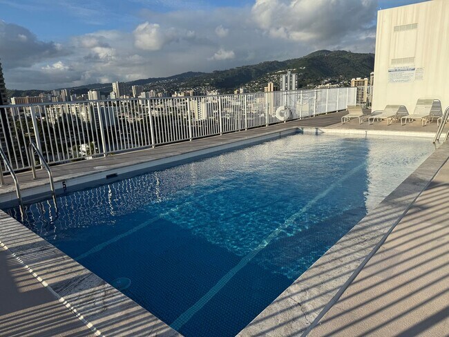 Building Photo - Oahu Surf 2 - 2 bdrm, 2 bath, 1 pkg, Free Water, Sewer, & Electricity