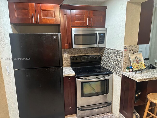 Building Photo - 7400 W 17th Ave