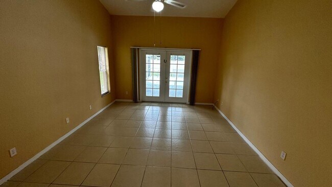 Building Photo - SPACIOUS 4-BEDROOM HOME WITH SCREENED POOL IN SE CAPE CORAL