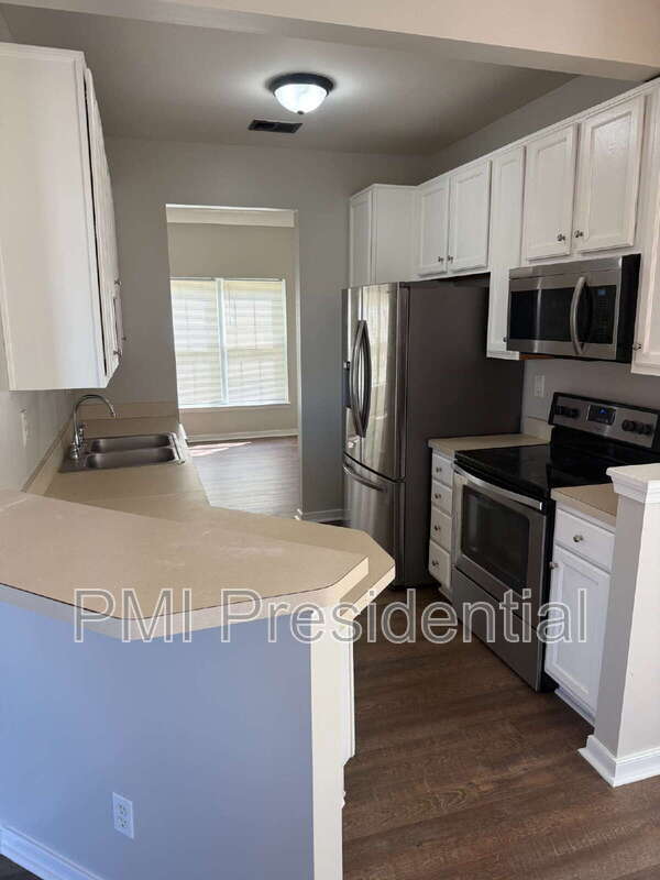 Building Photo - 1213 Magnolia Pointe Blvd