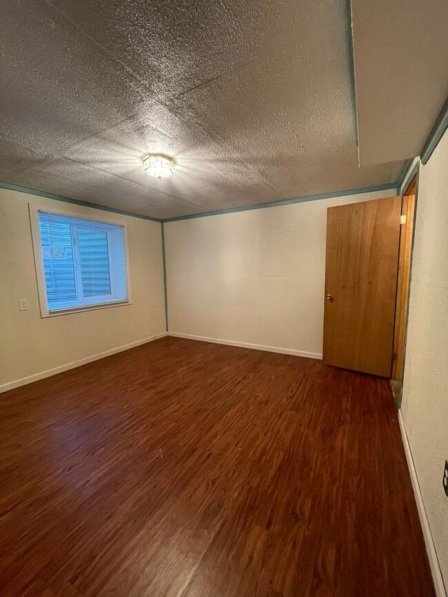 Building Photo - STUDENTS WELCOME! Centrally-Located Ranch Home w/ Fenced Yard and Two-Car Garage