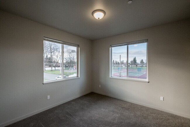 Building Photo - Must see modern apartment near pickleball courts and community amenities!