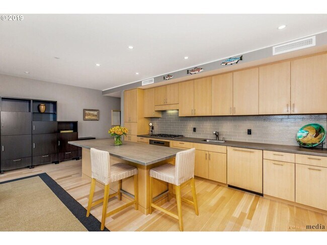 Building Photo - Stunning Pearl District Corner Unit with Floor-To-Ceiling Windows, Two Secured Parking Spots, Bal...