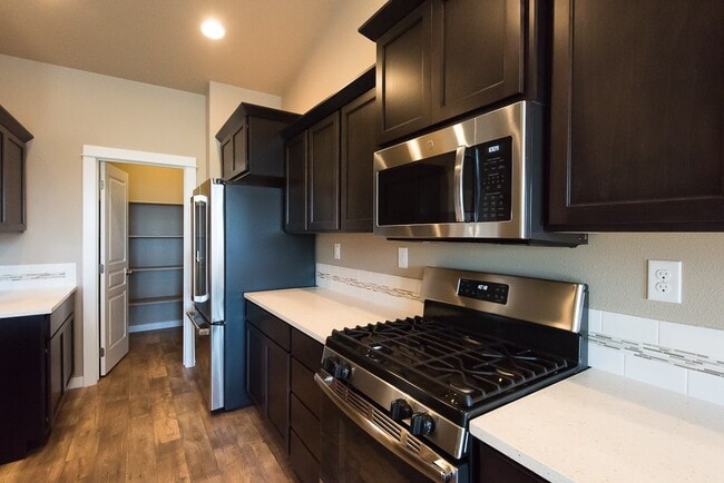 Building Photo - New 4 Bedroom Home in Post Falls with 3 Car Garage!