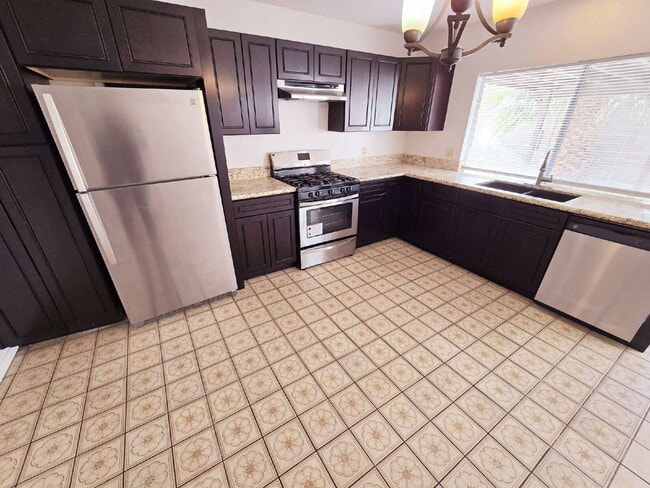 Building Photo - Spacious 4-Bedroom Oasis with Elegant Granite Touches in Vibrant Las Vegas!