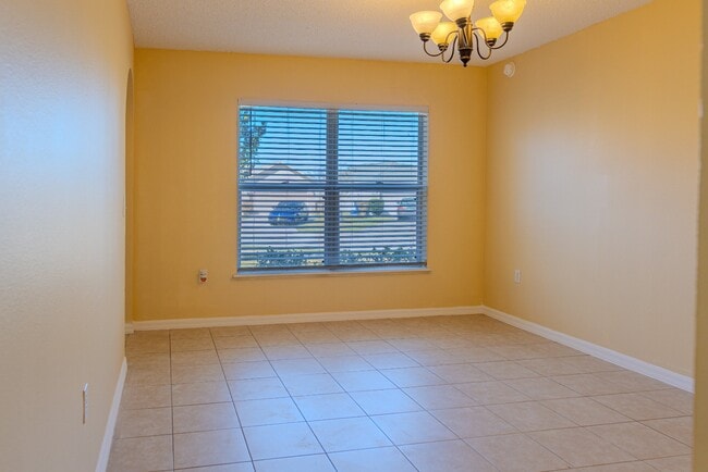 Building Photo - Spacious 4-Bed Groveland Home with Attached Garage, Central Air, and Private Patio