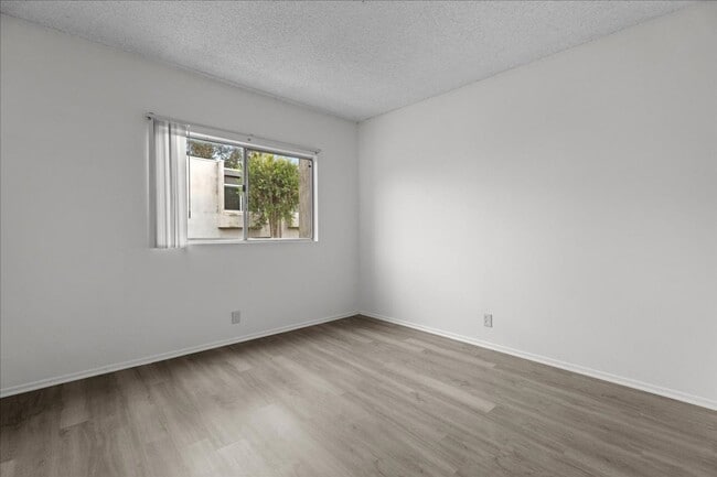 Building Photo - Two-Story Townhome with Private Garage and...