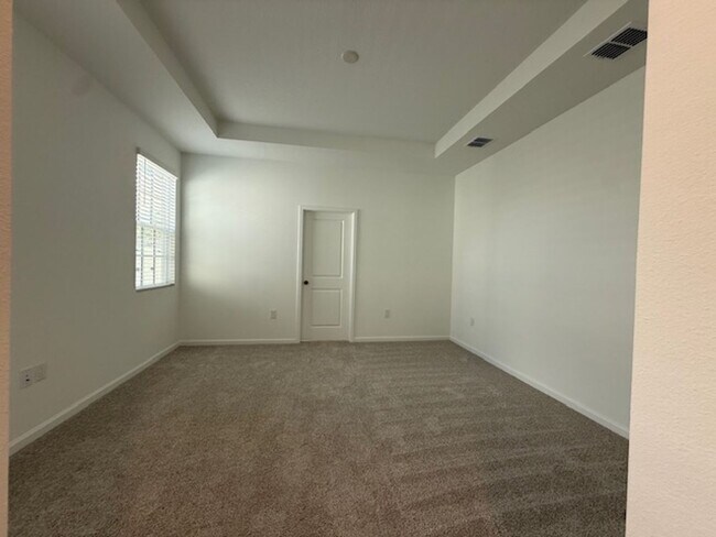 Building Photo - Brand new construction 3 Bedroom Town Home in Island Village of Celebration