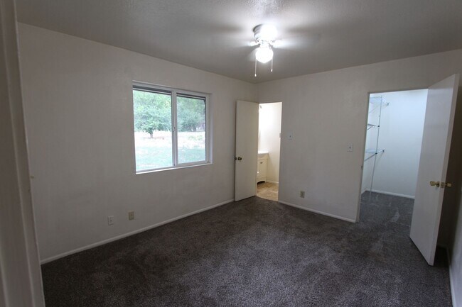 Building Photo - COMING AUGUST | 3-Bedroom Home in Bow & Arrow Acres | Large Yard + Wood-Burning Fireplace