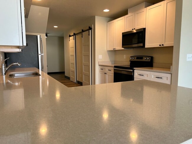 Building Photo - 3 Bed / 2.5 Bath Townhouse with Fenced Yard – Great Kalispell Location!