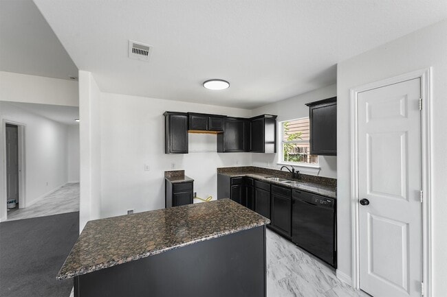 Building Photo - 7010 Dahlia Rd