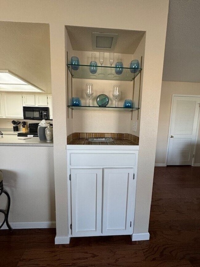 Building Photo - Riverfront 2BR 2BA Furnished Condo on GROUND LEVEL W/Garage and UTILITIES Included AVAIL 4/1/26