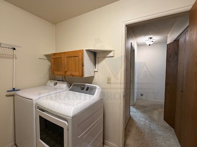 Building Photo - Single-Level 3-Bedroom Townhome with Primary Suite & Attached Garage