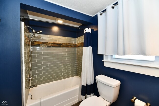 Building Photo - 6186 Evanston Ave