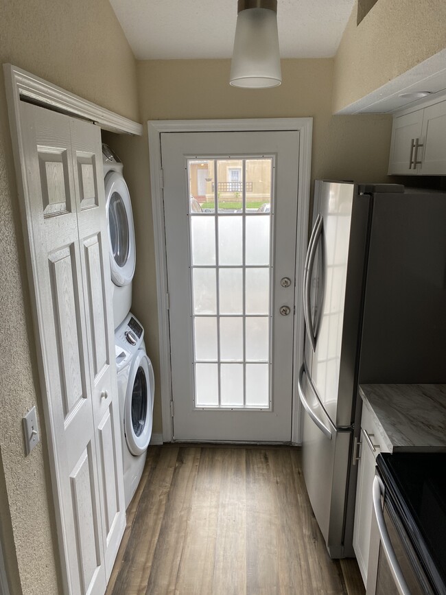 Kitchen/Laundry area - 3109 Sandy Shore Ln