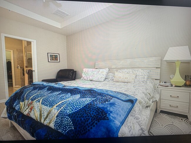 Master bedroom with tray ceiling - 8012 Olive Brook Dr