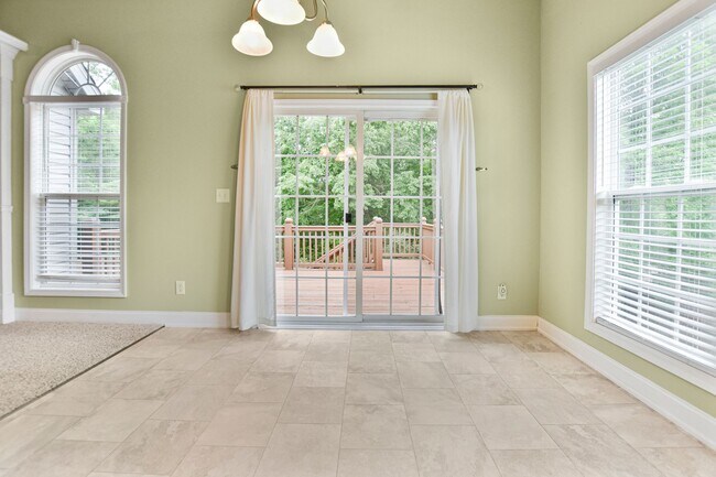 Building Photo - Dog Friendly Three Bedroom with Bonus!