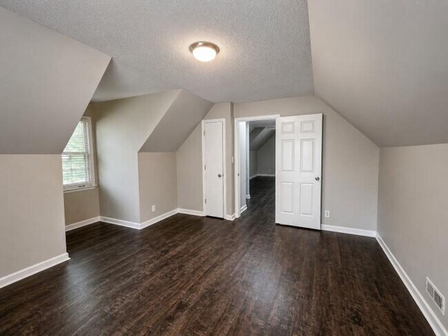 Building Photo - Welcome home to the perfect blend of peaceful country charm and modern city living!
