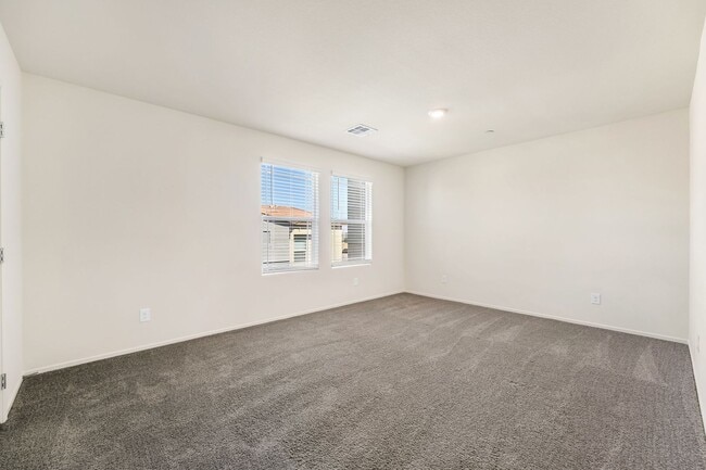 Building Photo - Modern West Henderson Townhome with Sleek Upgrades & Smart Home Features!