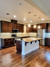 Building Photo - Rich Rubbed Walnut Flooring, Berber Carpet...