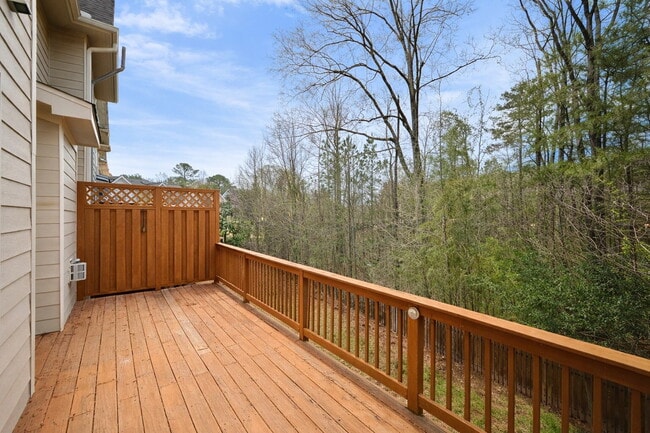 Building Photo - Gated Johns Creek Townhome Offering Space, Privacy, and Everyday Convenience