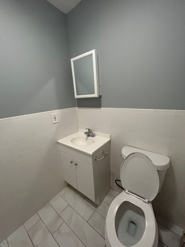 Building Photo - Discover Your Dream Home in Neptune: Spacious 4-Bedroom, 2.5-Bath with Private Backyard and Drive...