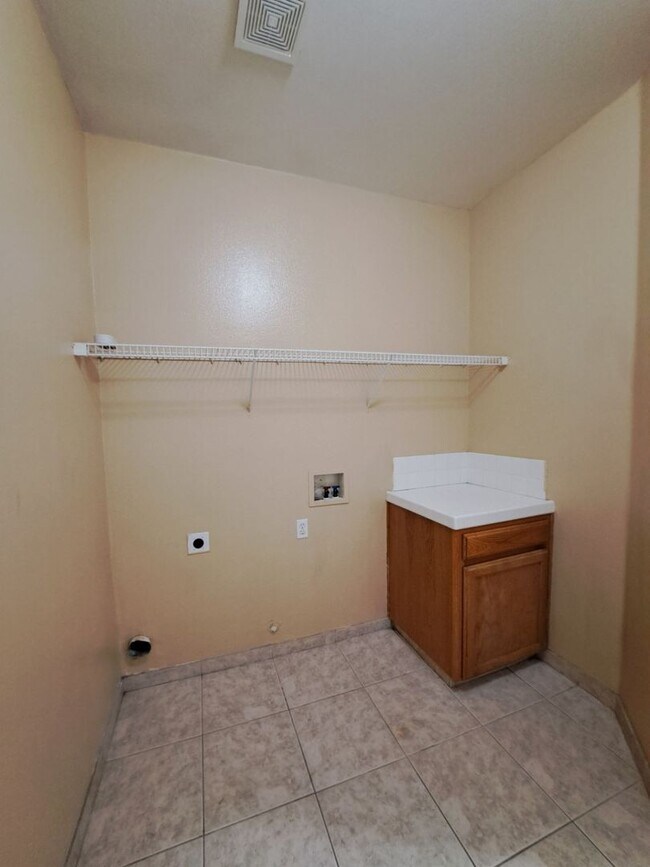 Building Photo - Move in Special: Half OFF your 1st Month's Rent! Elegant 4 Bedroom Home w/ Upstairs Loft Move in ...