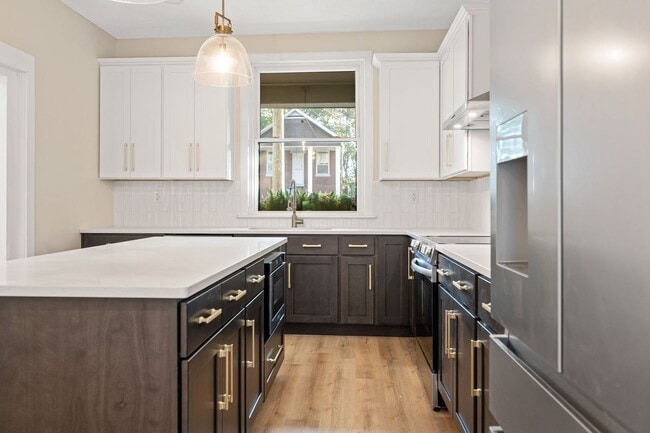 Building Photo - NORTHSIDE RARE GEM - FULLY RENOVATED 5+ BE...