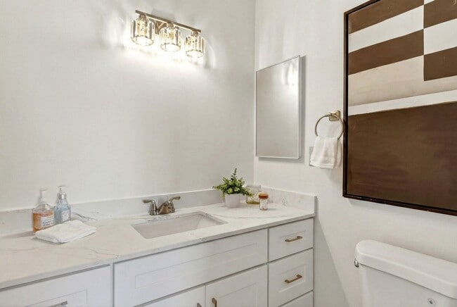 Building Photo - Modern 2-Bedroom Condo with Pool and Koi Pond Views