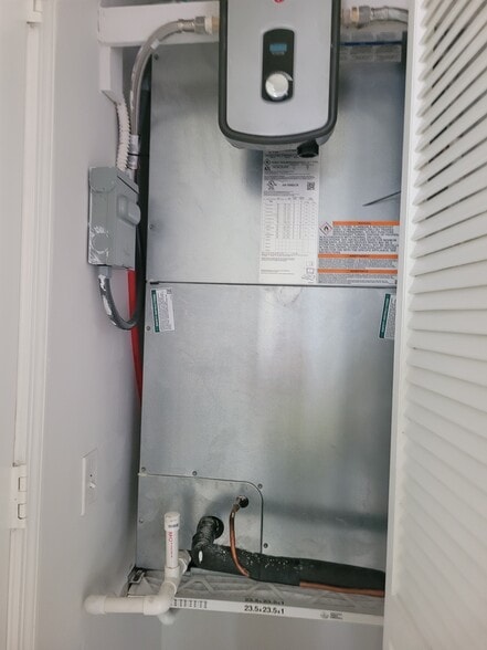 new a/c & tankless water heater - 2921 SE 13th Ave