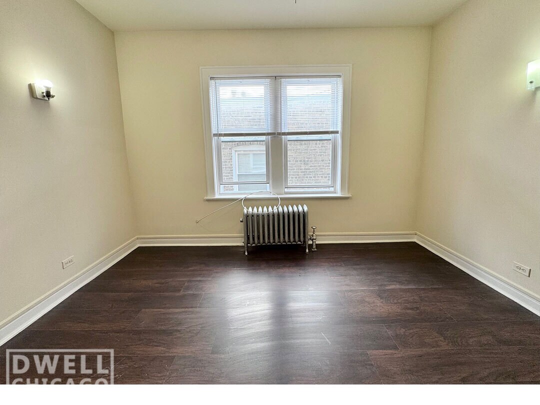 Building Photo - 6900 N Lakewood Ave