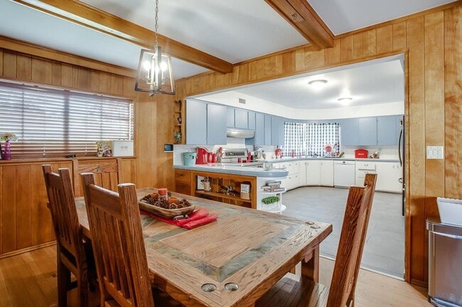 Building Photo - Spacious 4-Bedroom Home with Dual Living Areas