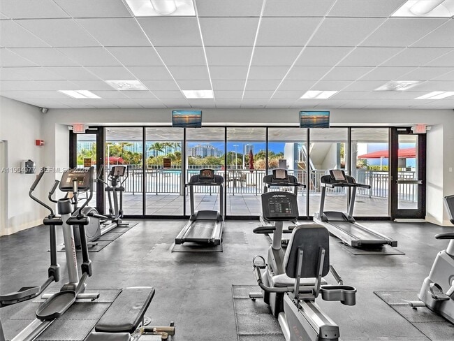 Building Photo - 3675 N Country Club Dr