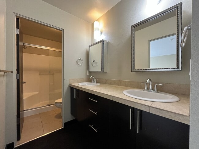 Building Photo - Charming 3 Bedroom, 2.5 Bathroom Home with Large Living Room, Tall Windows, Island Kitchen, and A...