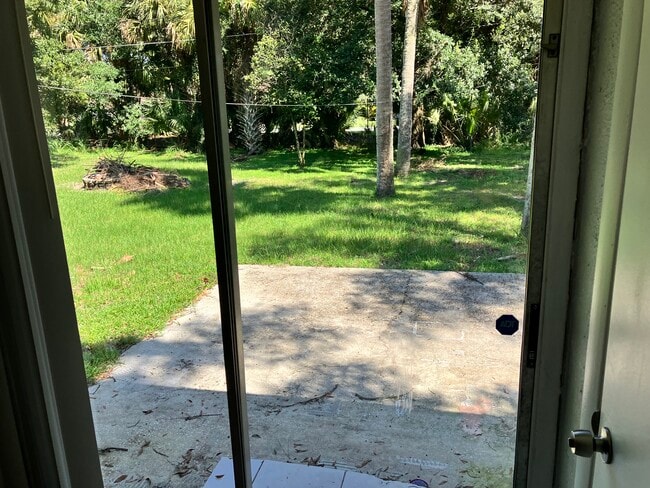Large backyard with fence and patio - 1331 S Summerlin Ave