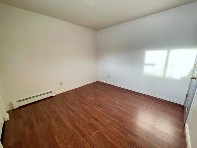Building Photo - East Anchorage Condo with Laminate Floorin...