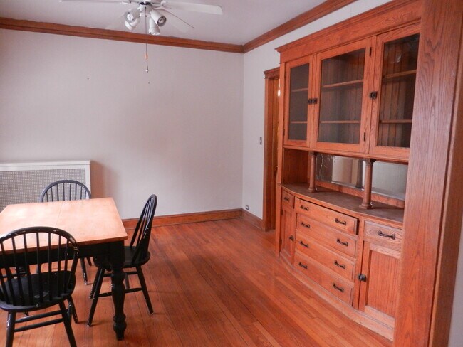 dining room with built-in china cabinet - 818 N 11th Ave