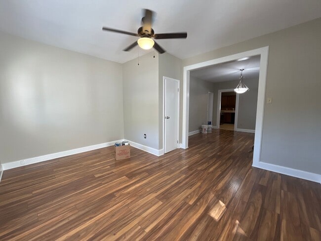 Building Photo - Move-in ready and well-maintained, this 4-...