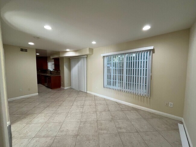 Building Photo - Upgraded 3+2.5 end unit w/attached garage ...