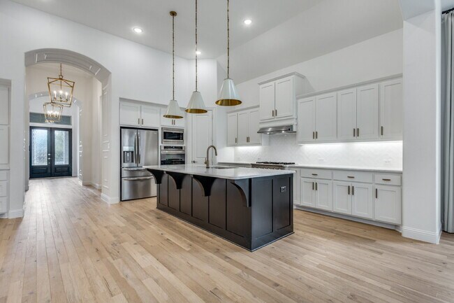 Building Photo - "Luxurious 4-Bed Retreat with Movie Room & Marble Elegance in Celina, TX!"