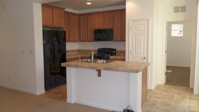 Building Photo - $1,997.00 - Walking Paths - Close to Schools and Shopping - Skiing - Community Pool