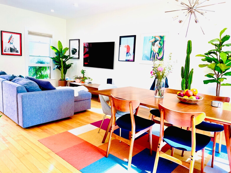 High ceilings & large windows as well as skylight + recessed lighting & a mid-century chandelier - 328 Harriet St