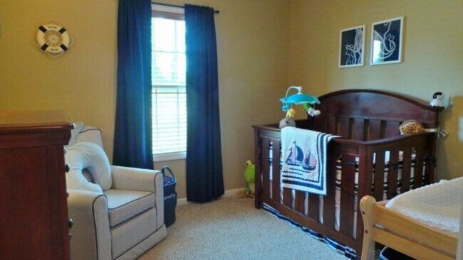 Building Photo - Modern Elegance Meets Spacious Comfort: 4B...