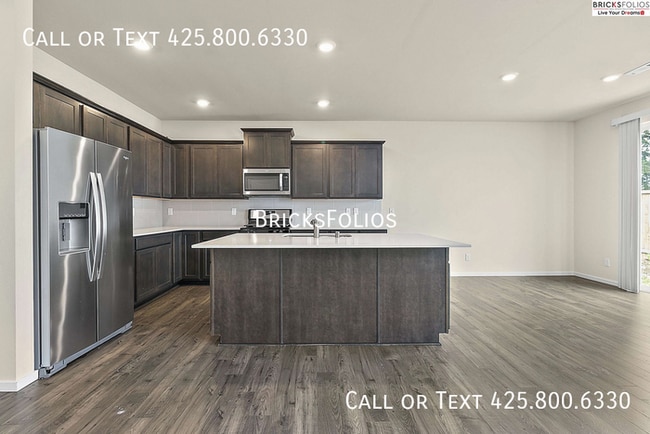 Building Photo - Your Dream Home Awaits in Puyallup – Bonus Offer Included!