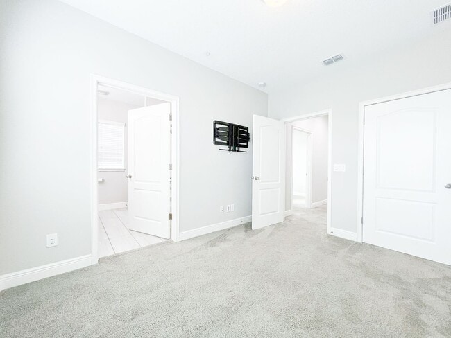 Building Photo - Lake Nona Move-In Special! Save $100/Month | 4 Bed, 3.5 Bath Laureate Park Townhome