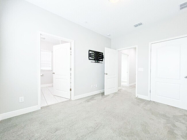 Building Photo - Luxury 4-Bedroom Townhome in Laureate Park – Now Available!